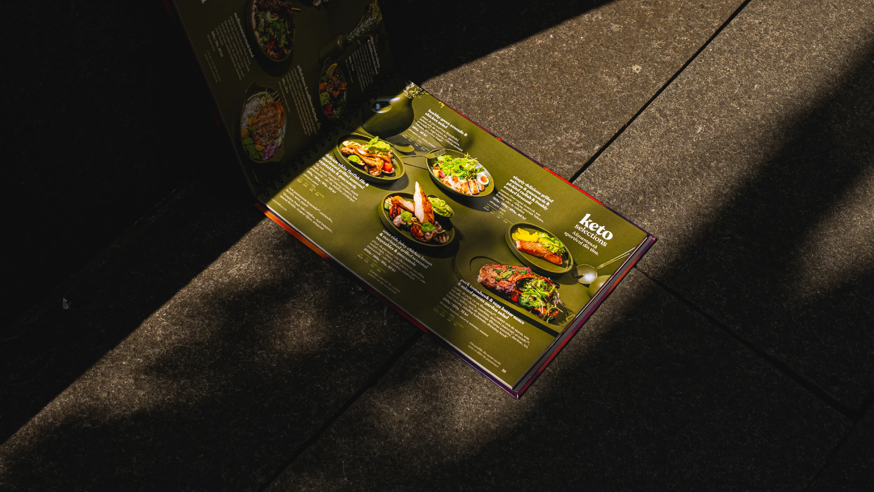 Open keto Marty Restaurants menu photographed in directional sunlight